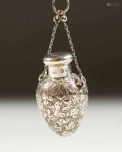 A TINY VICTORIAN ENGRAVED SILVER EGG SHAPED SCENT BOTTLE with screw top on a chainby SAMPSON &