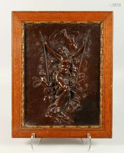 19TH CENTURY FRENCH SCHOOL. A BRONZE PLAQUE OF A GIRL ON A SWING with cupids. 38cms by 28cms, in a