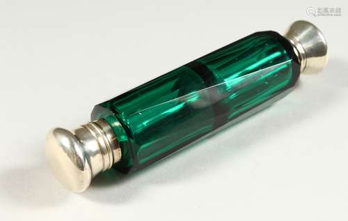 A VICTORIAN GREEN GLASS FACET CUT DOUBLE ENDED SCENT BOTTLE with glass stopper. 11.5cms long.