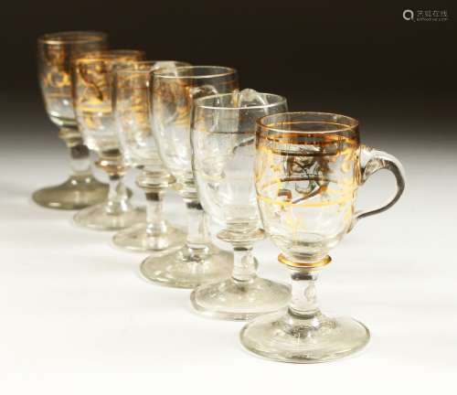 A SET OF SIX GLASS CUSTARD GLASSES.