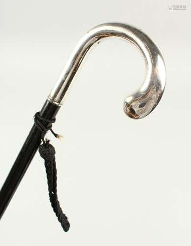 A WALKING STICK with ALPACA SILVER CURVING HANDLE. 2ft 10ins long.