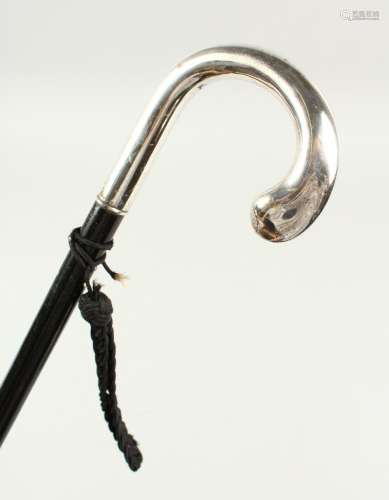 A WALKING STICK with ALPACA SILVER CURVING HANDLE. 2ft 10ins long.