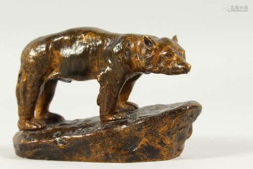 GEORGES OMERTH (Active 1895-1925) FRENCH, A SMALL BRONZE MODEL OF A POLAR BEAR, standing on a