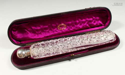 A SUPERB LONG CUT GLASS SCENT BOTTLE BY SAMPSON MORDAN wirh screw off silver cap, in a leather