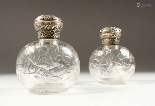 A SUPERB PAIR OF VICTORIAN STEVENS & WILLIAMS INTAGLIO CRYSTAL SCENT BOTTLES AND STOPPERS with