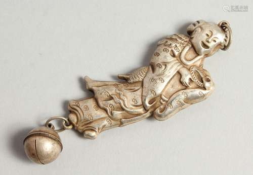 A CHINESE SILVER RATTLE as a woman.