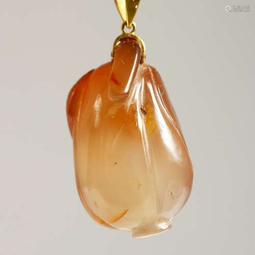 A 14CT GOLD PENDANT as a fruit.