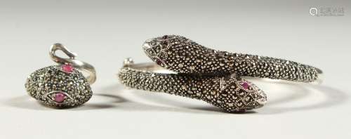 A SILVER AND MARCASITE SET SNAKE RING AND BRACELET, boxed.