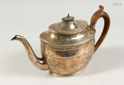 A GEORGE III OVAL TEAPOT with gadrooned edge, wooden finial and handle. London 1803. Maker Daniel