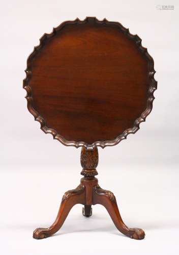 A CHIPPENDALE REVIVAL PIE CRUST TILT TOP TRIPOD TABLE, with 