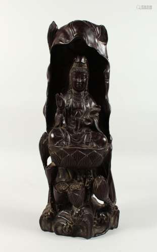 A LARGE CHINESE CARVED WOOD FIGURE OF GUANYIN. 18ins high.