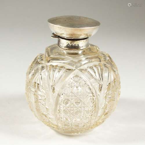 A GEORGE V CUT GLASS GLOBULAR SCENT BOTTLE with silver hinged top. Birmingham 1918. Maker The