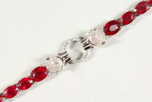 A SILVER RUBY SET PANTHER BRACELET, boxed.