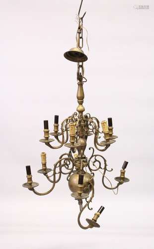 A GOOD DUTCH BRASS TWO TIER CHANDELIER with twelve scrolling branches. 2ft 5ins high x 2ft wide.