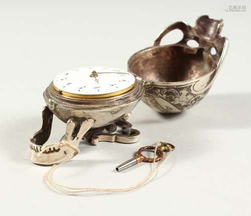 A RARE SILVER SKULL WATCH engraved with a classical female and opening to reveal a verge watch