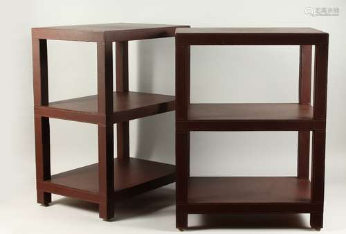 DOMINIC CHAMBON, A GOOD PAIR OF LEATHER COVERED THREE TIER OCCASIONAL TABLES. 48cms wide x 34cms