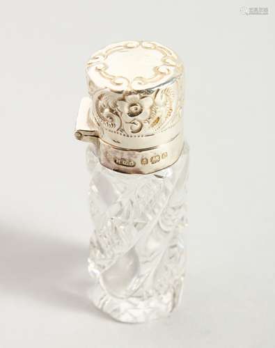 AN EDWARD VII CUT GLASS SCENT BOTTLE AND STOPPER with silver cap and band. Birmingham 1902. Maker A.