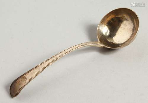 A GEORGE III BEAD EDGE SAUCE LADLES. lOndon 1782. Maker I. L.