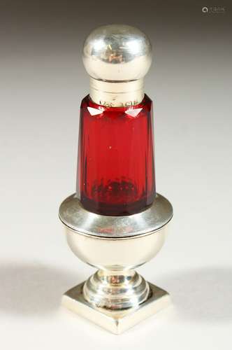 A VICTORIAN RUBY GLASS PEPPER POT SCENT BOTTLE with silver top and pedestal base. Birmingham 1899.