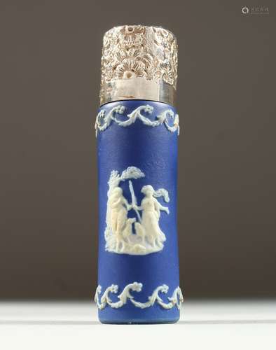 A VICTORIAN BLUE AND WHITE JASPER WARE SCENT BOTTLE with repousse silver top and glass stopper.