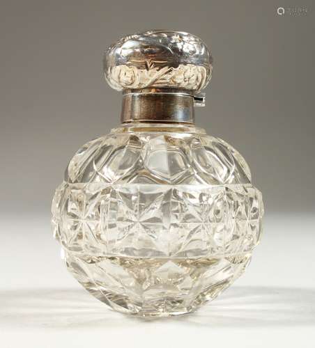 AN EDWARD VII CUT GLASS GLOBULAR SCENT BOTTLE with screw off silver top and band. Birmingham 1902.