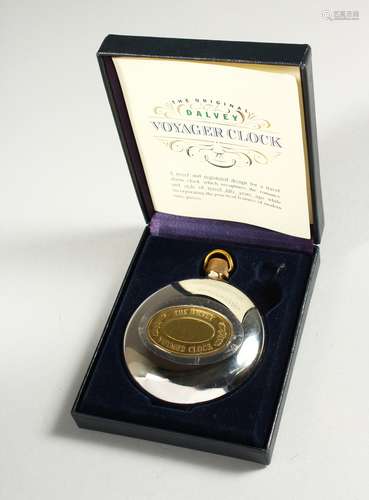 A VOYAGER CLOCK in a fitted case.