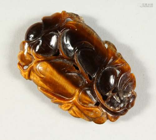A TIGER'S-EYE CARVING.