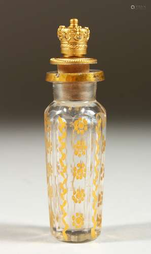 A VIENNA GILDED GLASS SCENT BOTTLE with screw off top as a crown. 7.5cms long.