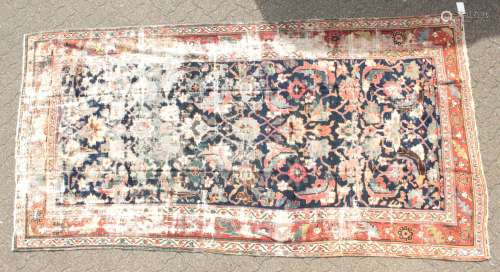 A LARGE PERSIAN MAHAL CARPET with some wear. 11ft x 5ft 10ins.