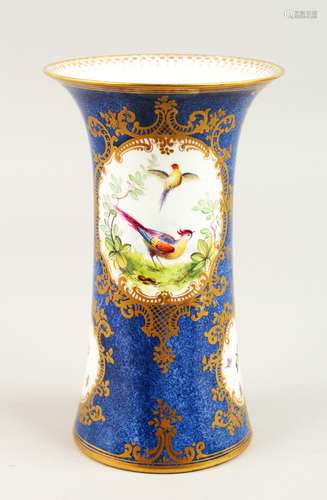 A SIMILAR STAFFORDSHIRE SPILL VASE, painted with panels of birds and insects. 21cms high.