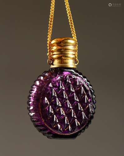 A SMALL VICTORIAN PURPLE-COLOURED GLASS SCENT BOTTLE with plated top and chain. 4cms diameter.