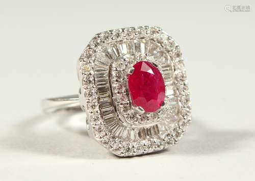 A SUPERB 18CT GOLD, DIAMOND AND RUBY BAGUETTE SET COCKTAIL RING, boxed.