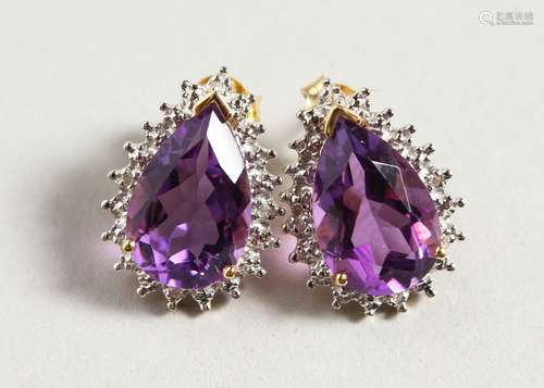 A GOOD PAIR OF 9CT GOLD TEAR DROP AMETHYST AND DIAMOND EARRINGS.