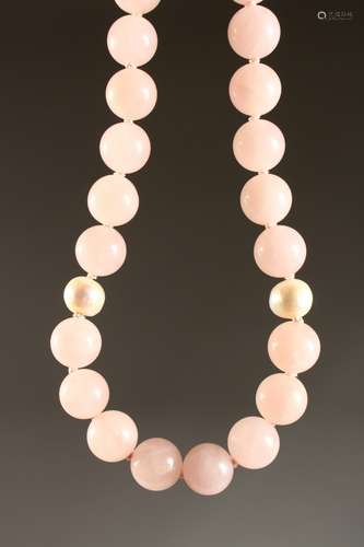 A GOOD STRING OF QUARTZ PINK TWENTY SIX AND TWO PEARLS.