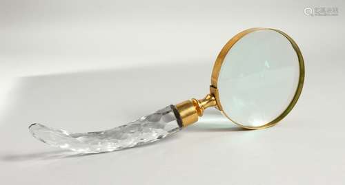 A MAGNIFYING GLASS with cut glass handle.