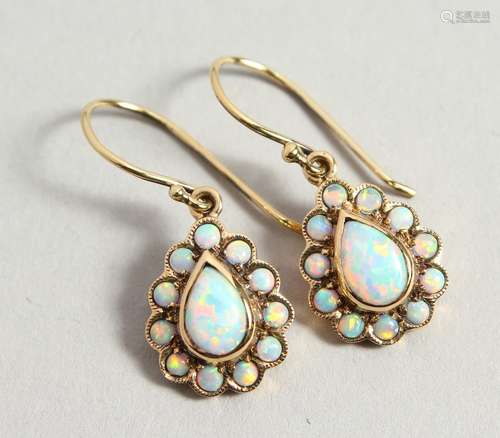 A PAIR OF 9CT GOLD PEAR SHAPED OPAL EARRINGS, boxed.