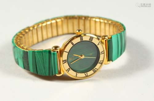 A UNITED WRISTWATCH with malachite face.