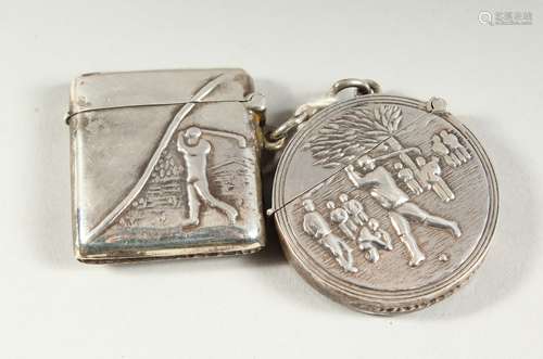 TWO SILVER GOLFING VESTA CASES.