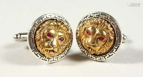 A PAIR OF SILVER LION MASK CUFFLINKS, boxed.