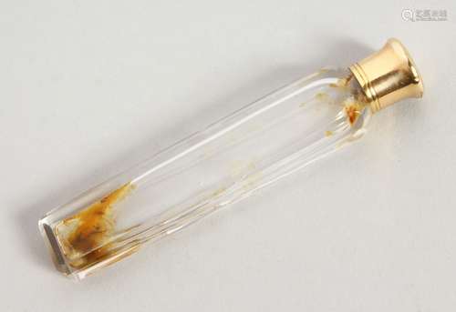 A 19TH CENTURY PLAIN CIRCULAR TAPERING SCENT BOTTLE AND STOPPER with screw off cap. 8.5cms long.