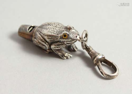 A NOVELTY SILVER FROG WHISTLE. 4cmd long.