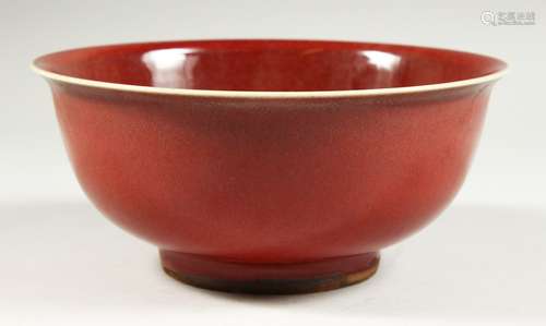 A CHINESE SANG DE BOEUF CIRCULAR BOWL. 6.75ins diameter.