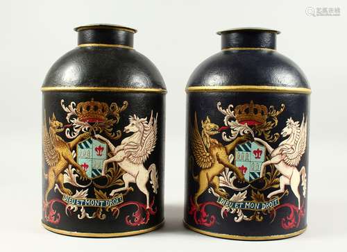 A PAIR OF TOLEWARE SPICE TINS AND COVERS, painted with a crest: DIEU ET MON DROIT. 1ft 2ins high.