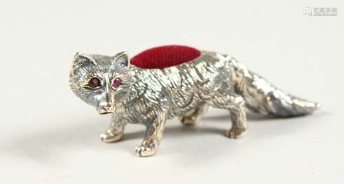 A NOVELTY SILVER FOX PIN CUSHION. 6cms long.