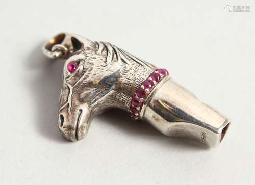 A NOVELTY SILVER HORSE WHISTLE. 4cms long.