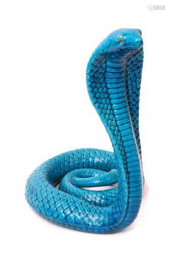 Pottery model of a rearing cobra in a turquoise glaze, possibly Bermantofts, the snake's eyes picked