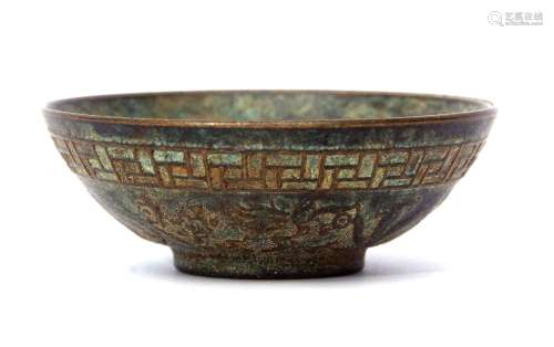 Miniature Chinese bronze bowl with archaistic scroll decoration with Chinese character to well and