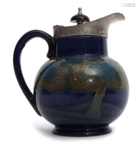 Early 20th century William Moorcroft globular jug with pewter mounts and Bakelite knop, the