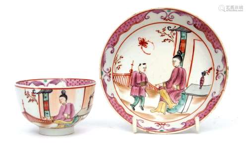 Lowestoft porcelain tea bowl and saucer circa 1775, with a chinoiserie design within pink cellular
