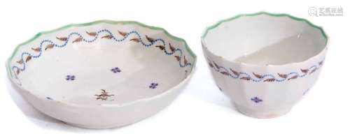 Lowestoft tea bowl and saucer circa 1790, of fluted form decorated with a Chantilly sprig design